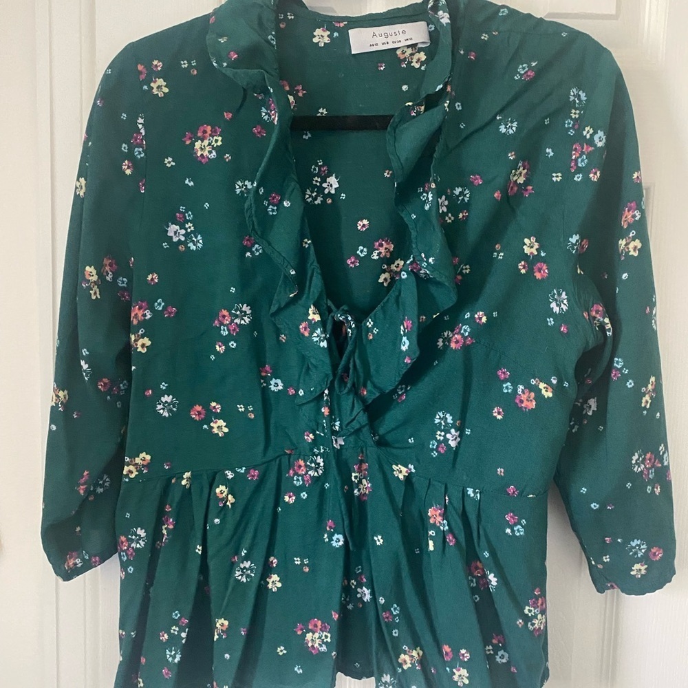 Auguste shirt. Dark green with floral highlights